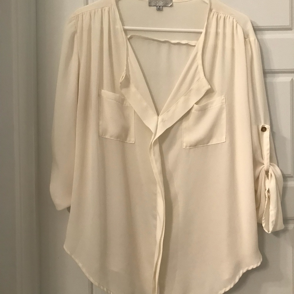 Off white sheer blouse.